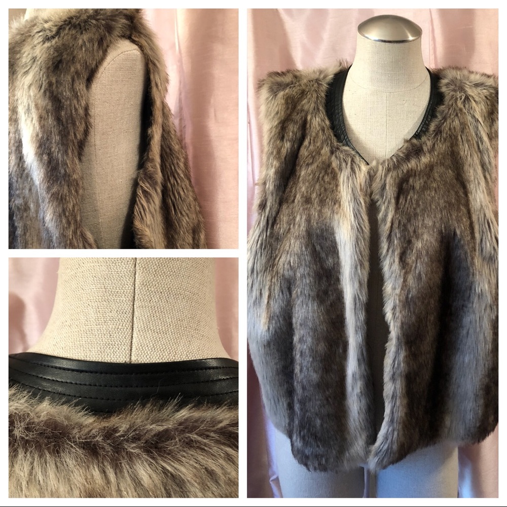 Faux Fur leather trimmed vest.